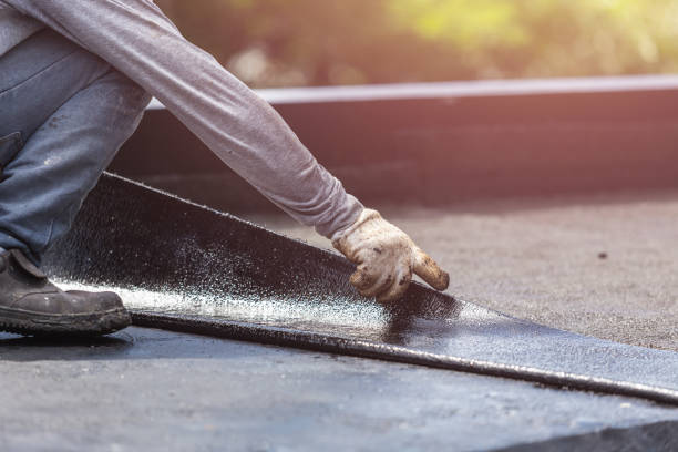 Professional Basement Waterproofing technician working in Bradford, OH